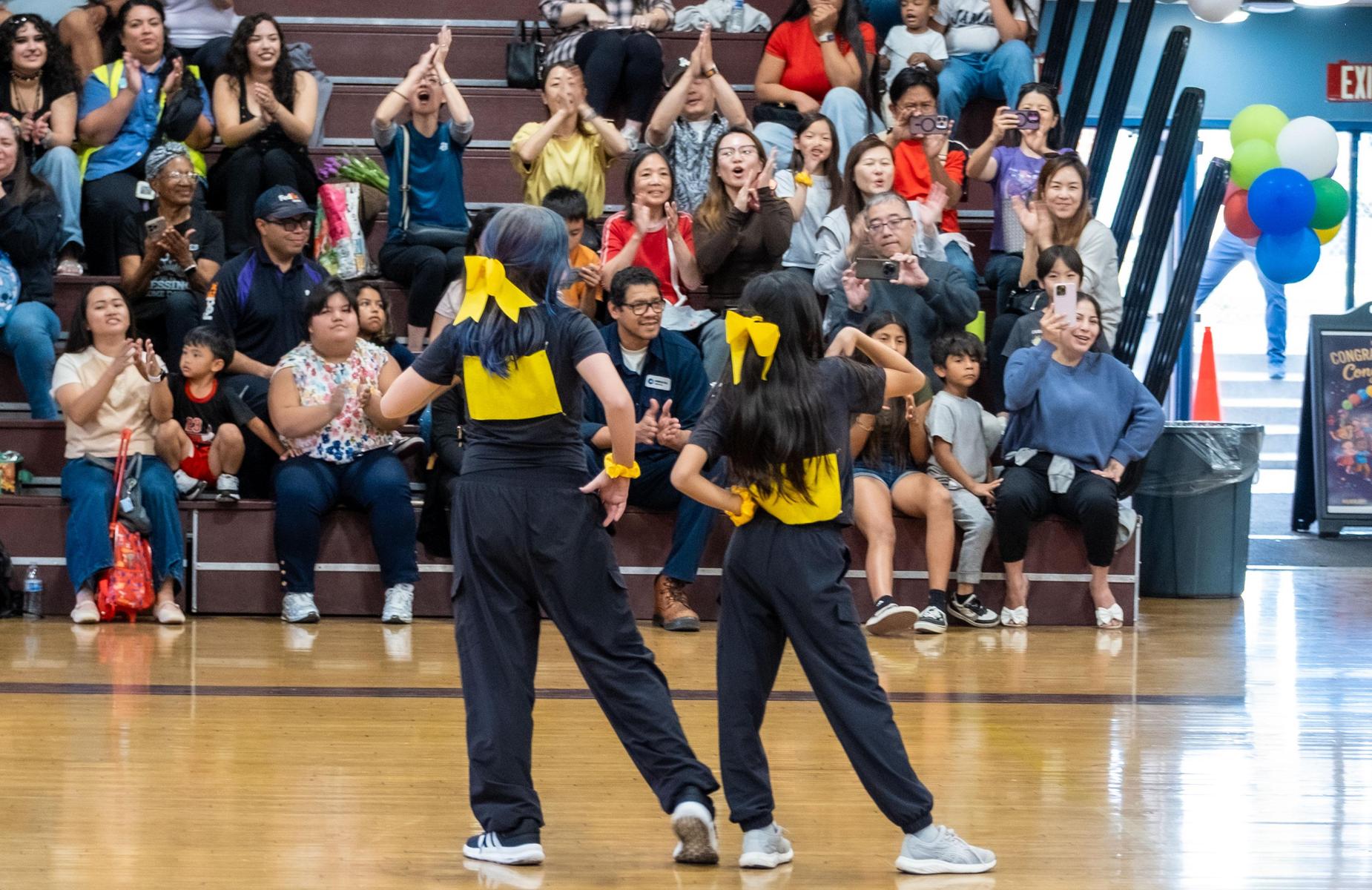 two students at conga kids