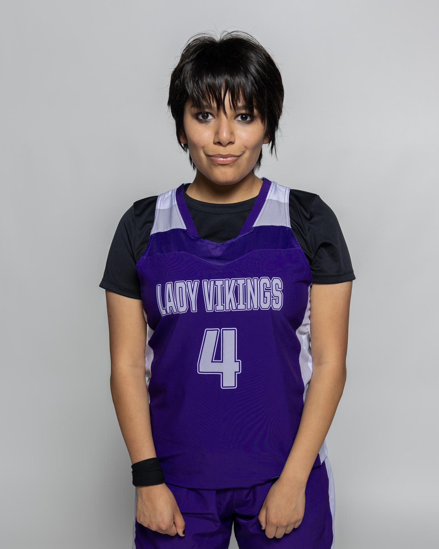 Female player number 4 posting for the roster