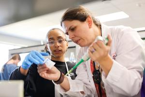 Science teacher and student