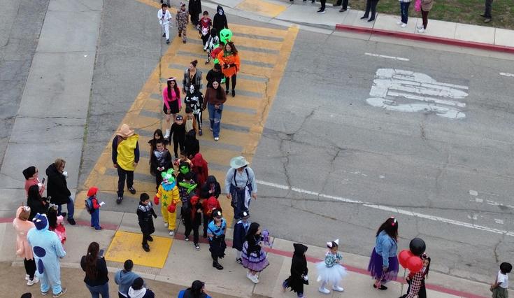 Students wearing costumes for the book parade at La Gloria Elementary.