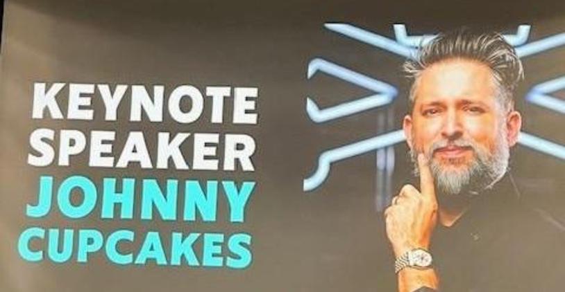 Announcement of keynote speaker Johnny Cupcakes with his image and name.
