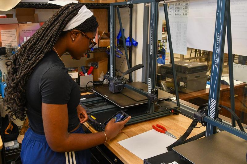 Student working on equipment