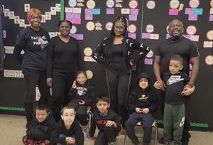 Staff and students wearing black to match