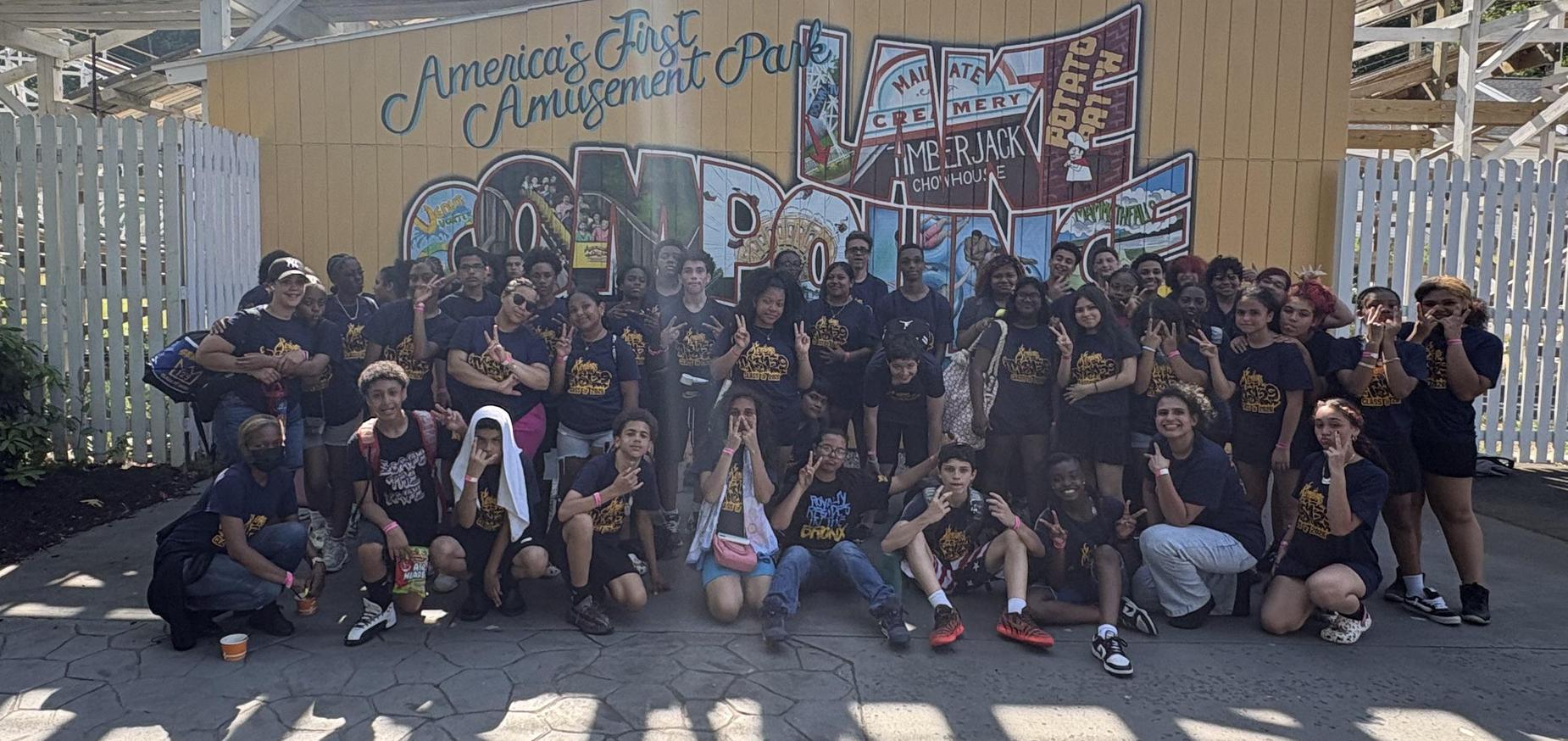 Group of students in front of Lake Compunce sign