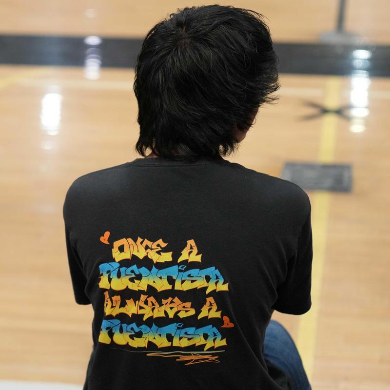 back of person's t-shirt which states Once a Puentista, Always a Puentista.