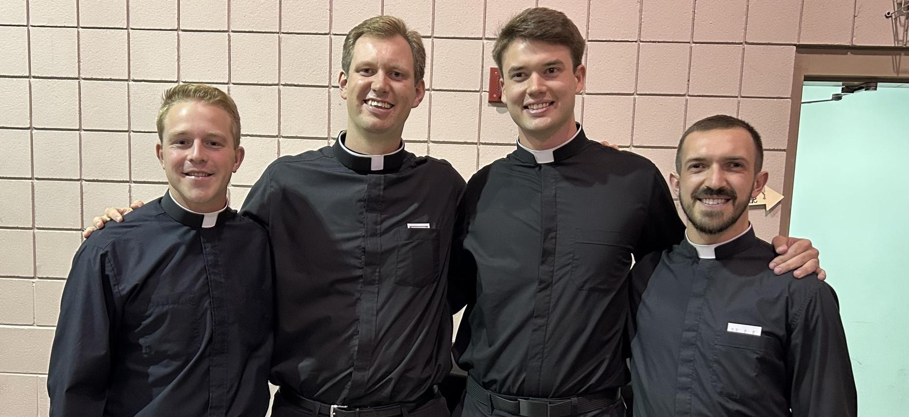 St. Joseph alumni studying to be Catholic priests attending the Homegrown Harvest Festival at St. Francis of Assisi Catholic Church Oct. 11.