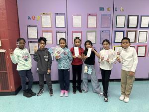 4th Graders showing off their work