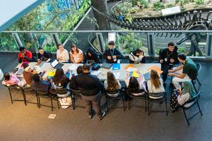 An overhead view of one of the tables filled with students