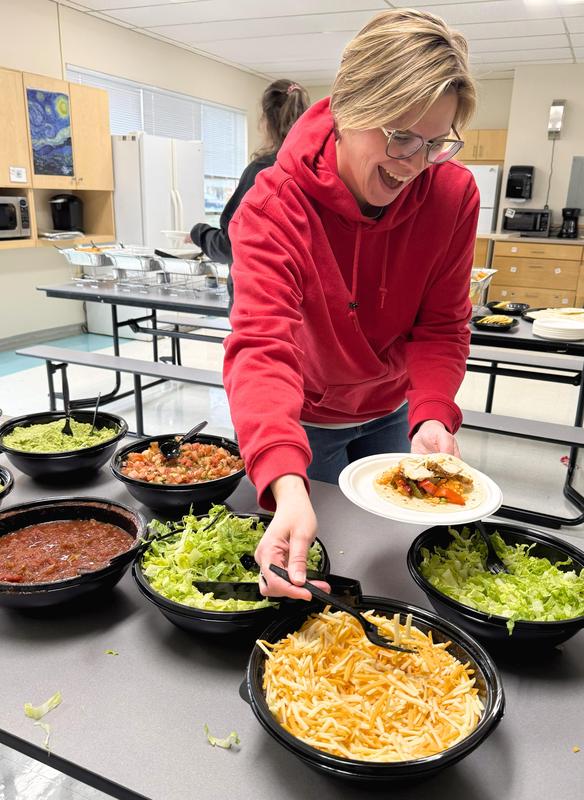 Teacher selecting lunch.