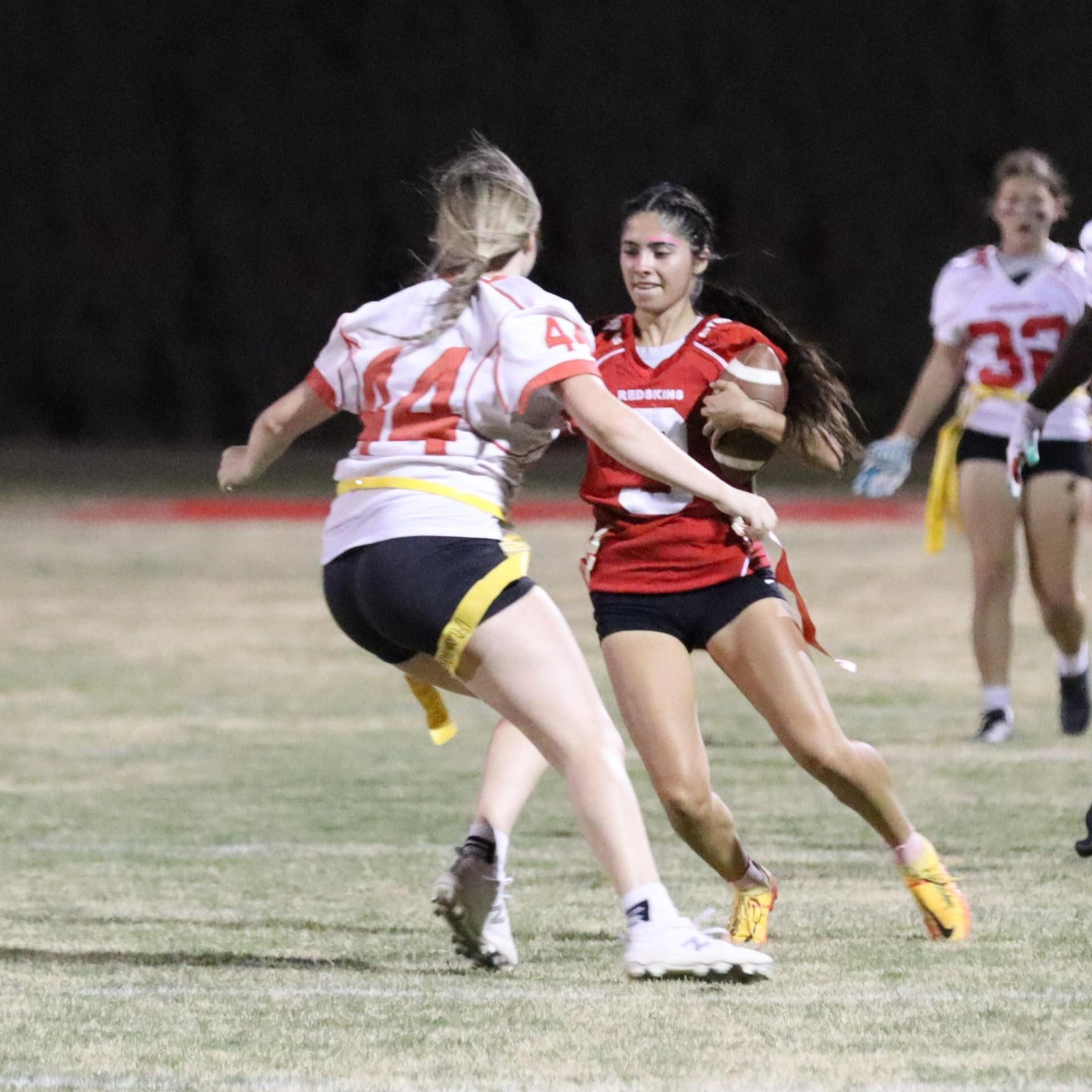 girls playing flag football