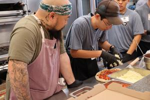 Students with Kitchen tABLE learn culinary skills
