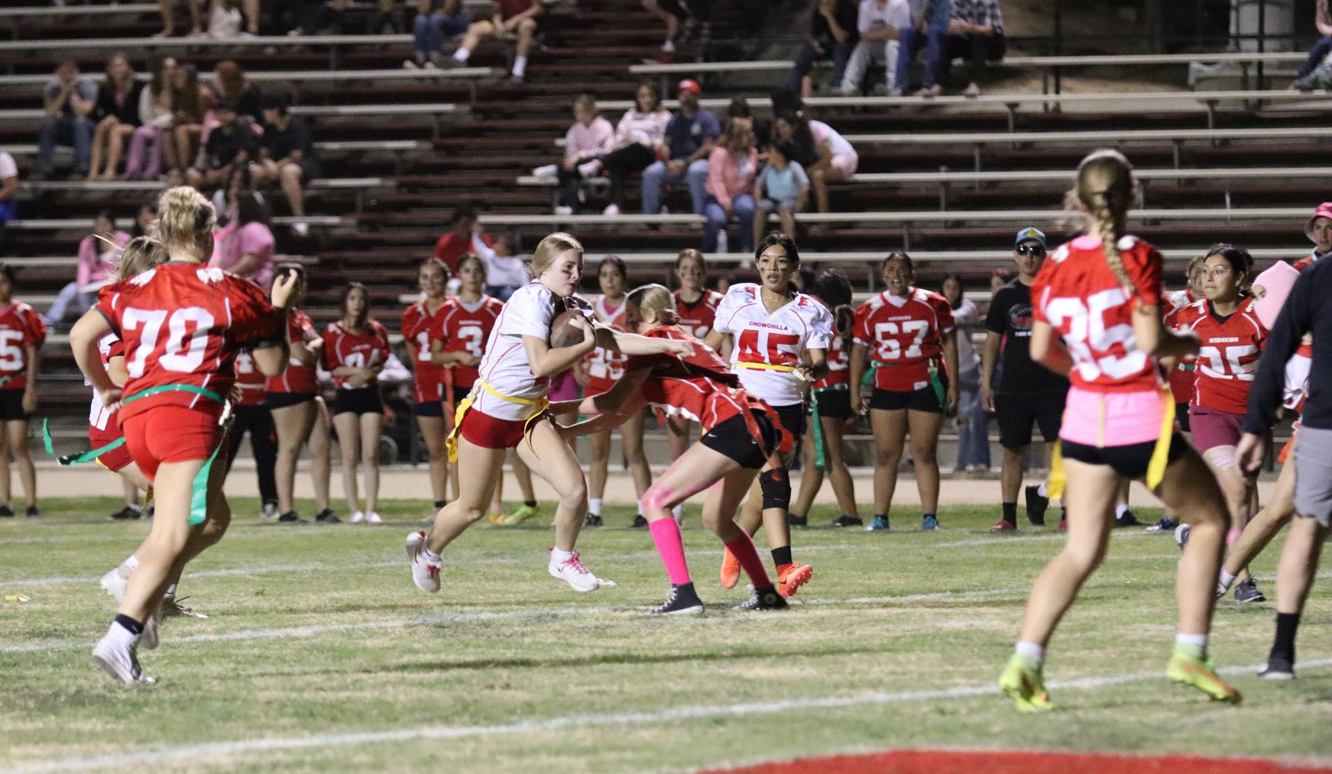 girls playing flag football