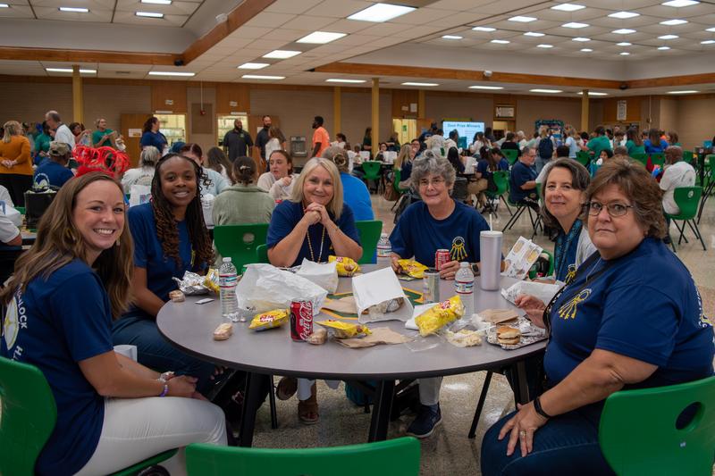 Teachers and staff enjoy lunch during IgnitePG, the district's annual professional development conference.