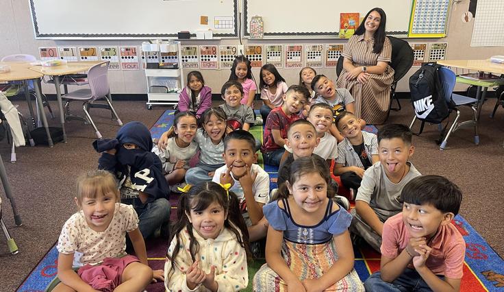 Students making silly faces the first day of school.