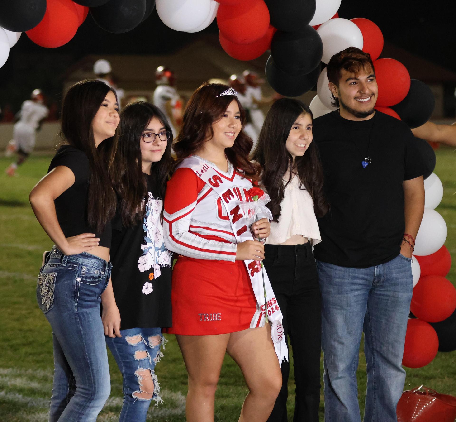 seniors and their escorts celebrating senior night
