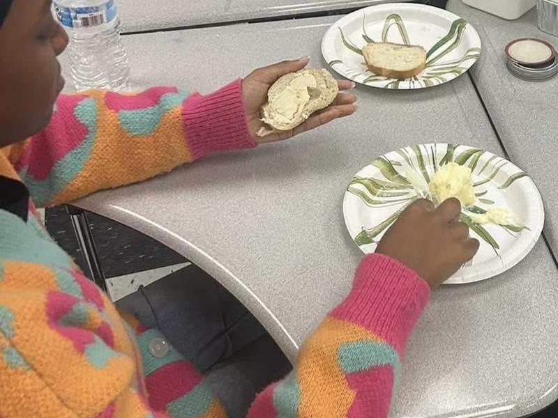 Softball Team standing in circle.