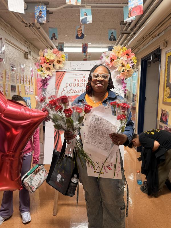Mrs. Jakes with her Bouquet of flowers