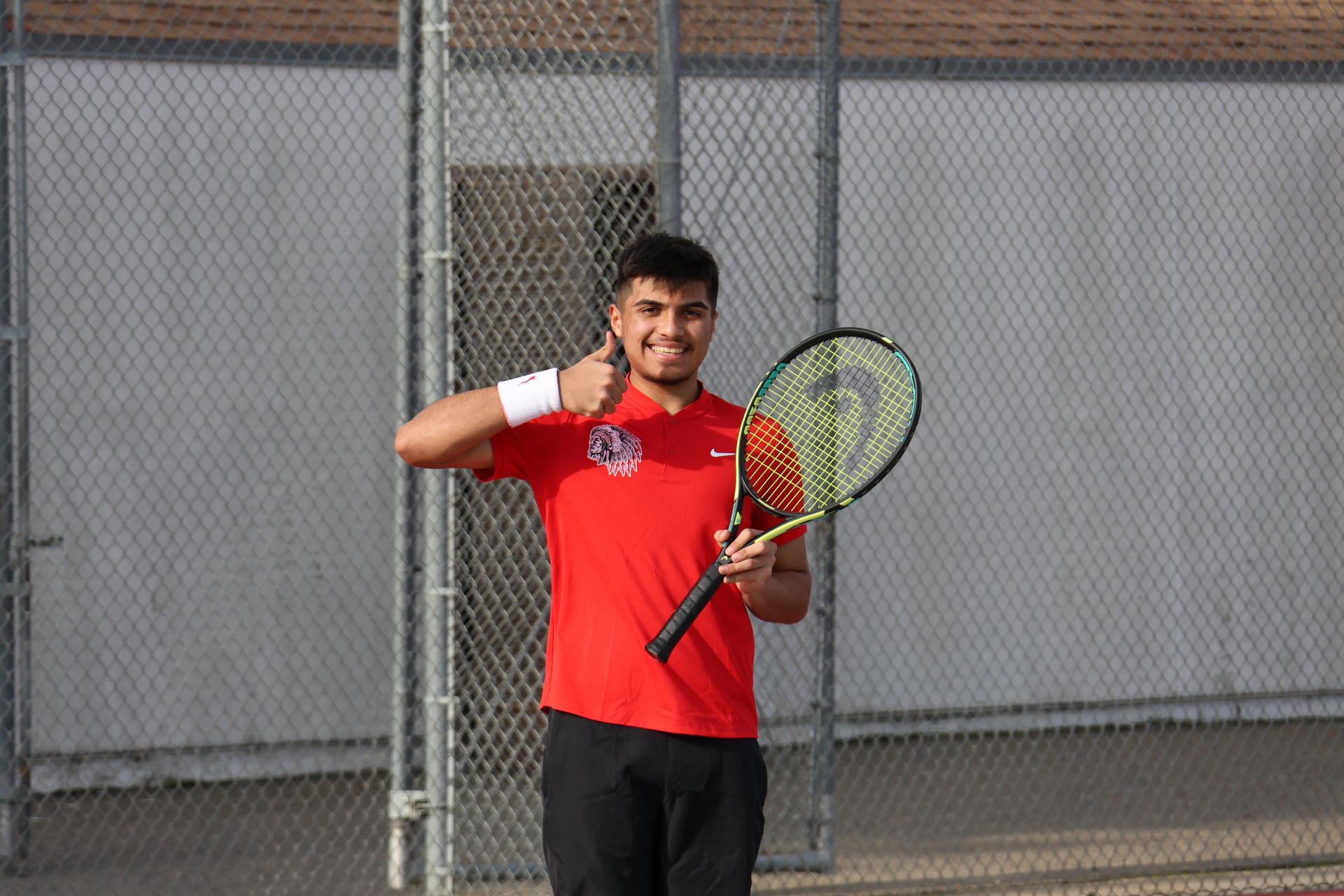 CUHS Boys playing tennis against coalinga