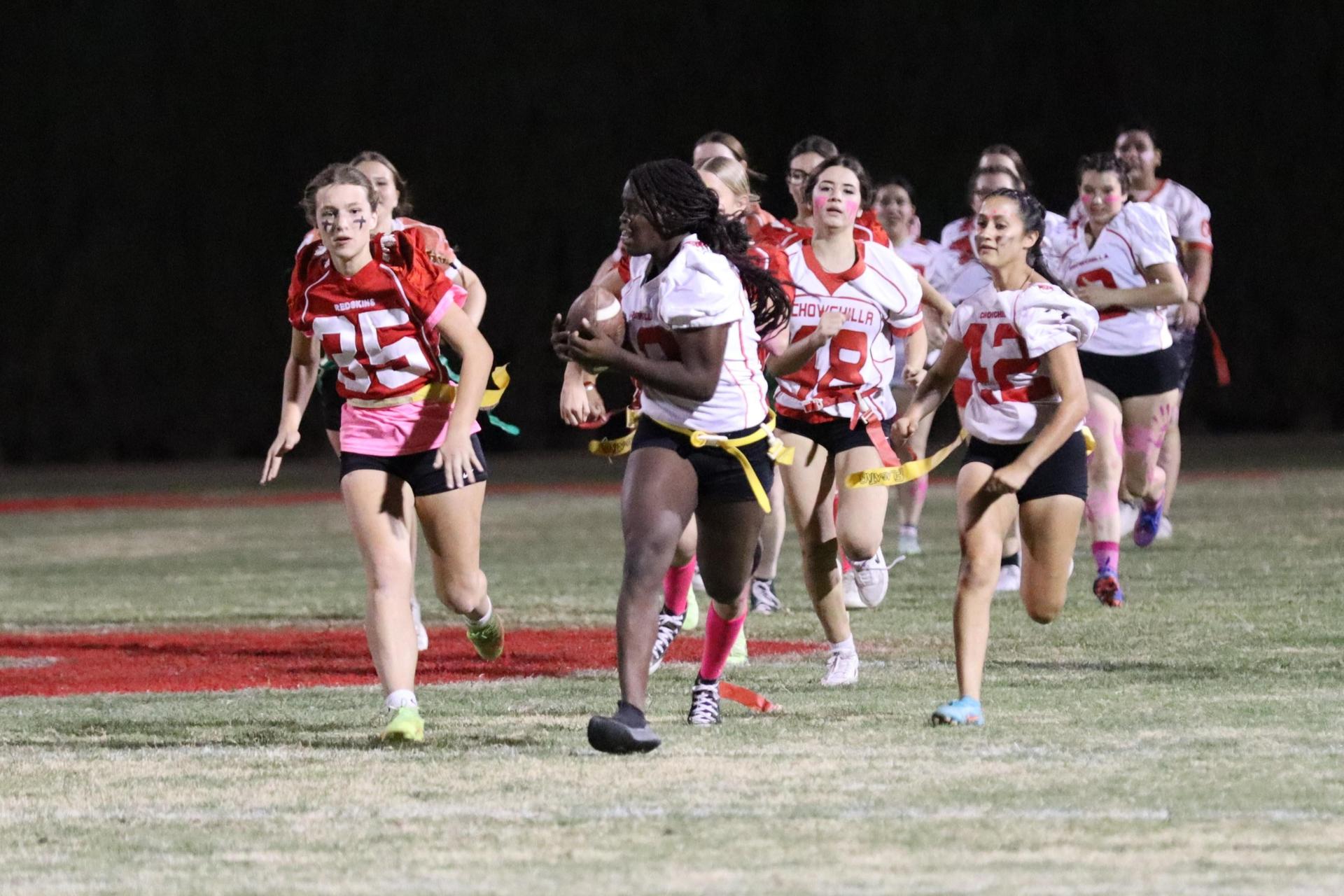 girls playing flag football