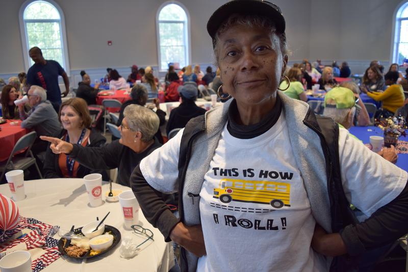 Bus Driver showing her decorated T-shirt