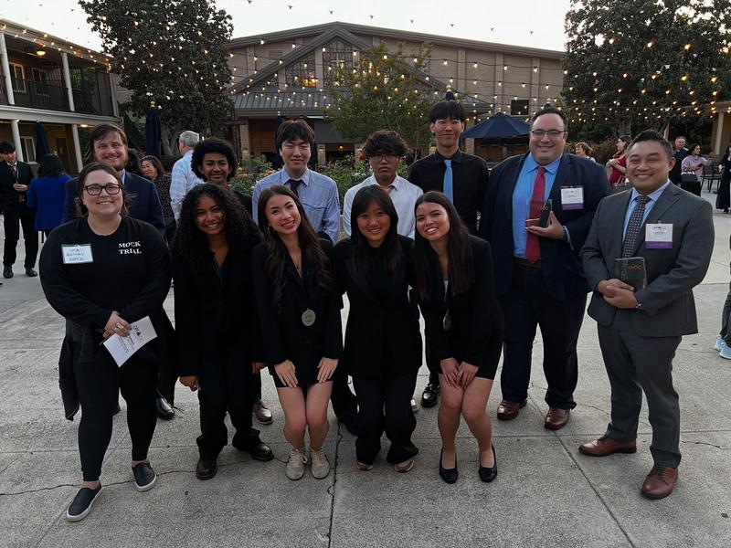a group photo of members and coaches of the BOHS mock trial team