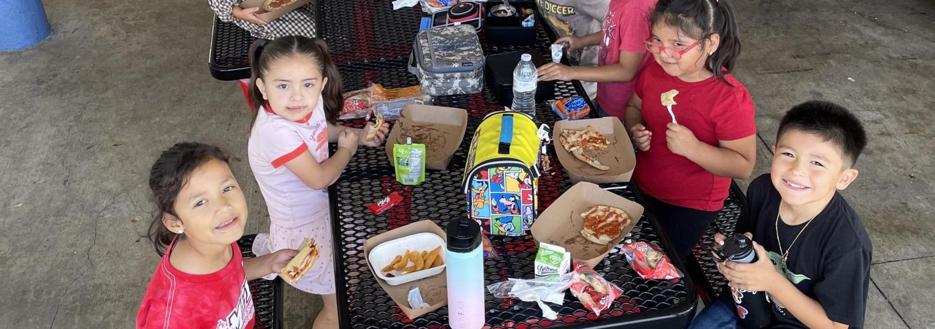 Kinder kids having a fun time at lunch!