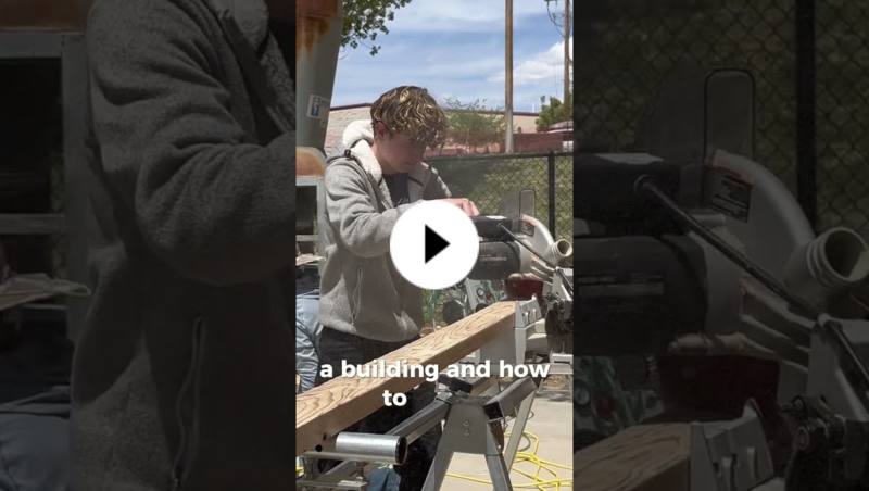 Escalante Middle School Construction Skills class student uses a power tool to build a playhouse