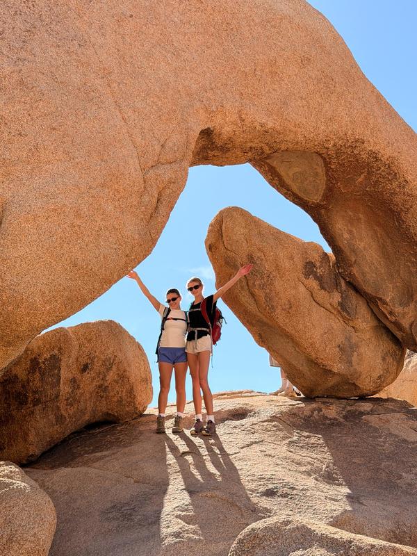 Two Students under an overhang