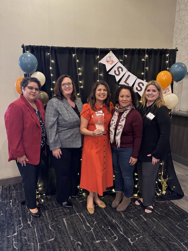 Claudia Barba poses for a group photo with her award at the 2025 Los Angeles County Office of Education Literacy Symposium. Left to right: Tracy Elementary Principal Dr. Laura Rodriguez, BPUSD Assistant Superintendent of HR Dr. Christine Heinrichs, Literacy Coach and honoree Claudia Barba, BPUSD TOSA Laura Reyes, BPUSD Director of Student Achievement Dr. Russhell Martinez.