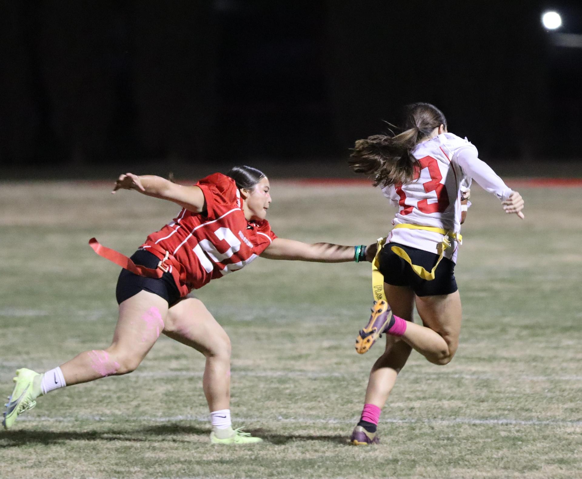 girls playing flag football