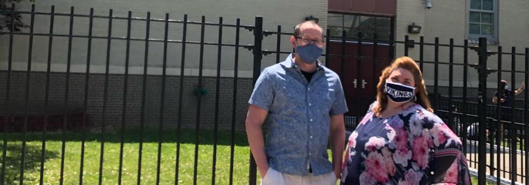 Mrs. Ferrante and Mr. Imbemba in front of IS 7