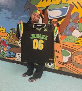 student showing off for Jamaica
