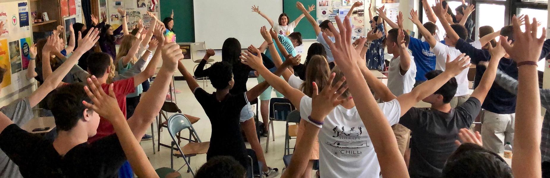 Photo of WHS students participating in mindfulness session.
