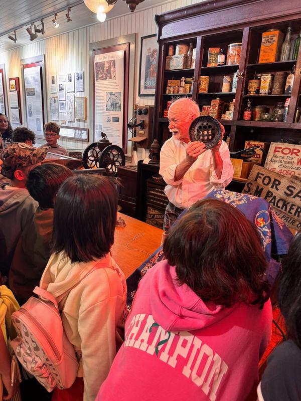 South Pasadena Historical Museum docent Larry McGrail shares artifacts from the General Store. (Photo Courtesy of South Pasadena Unified School District)