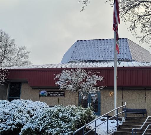 Picture of the District Office dusted in snow