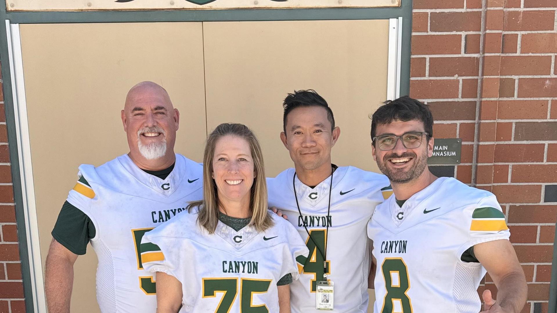 teachers in football uniforms