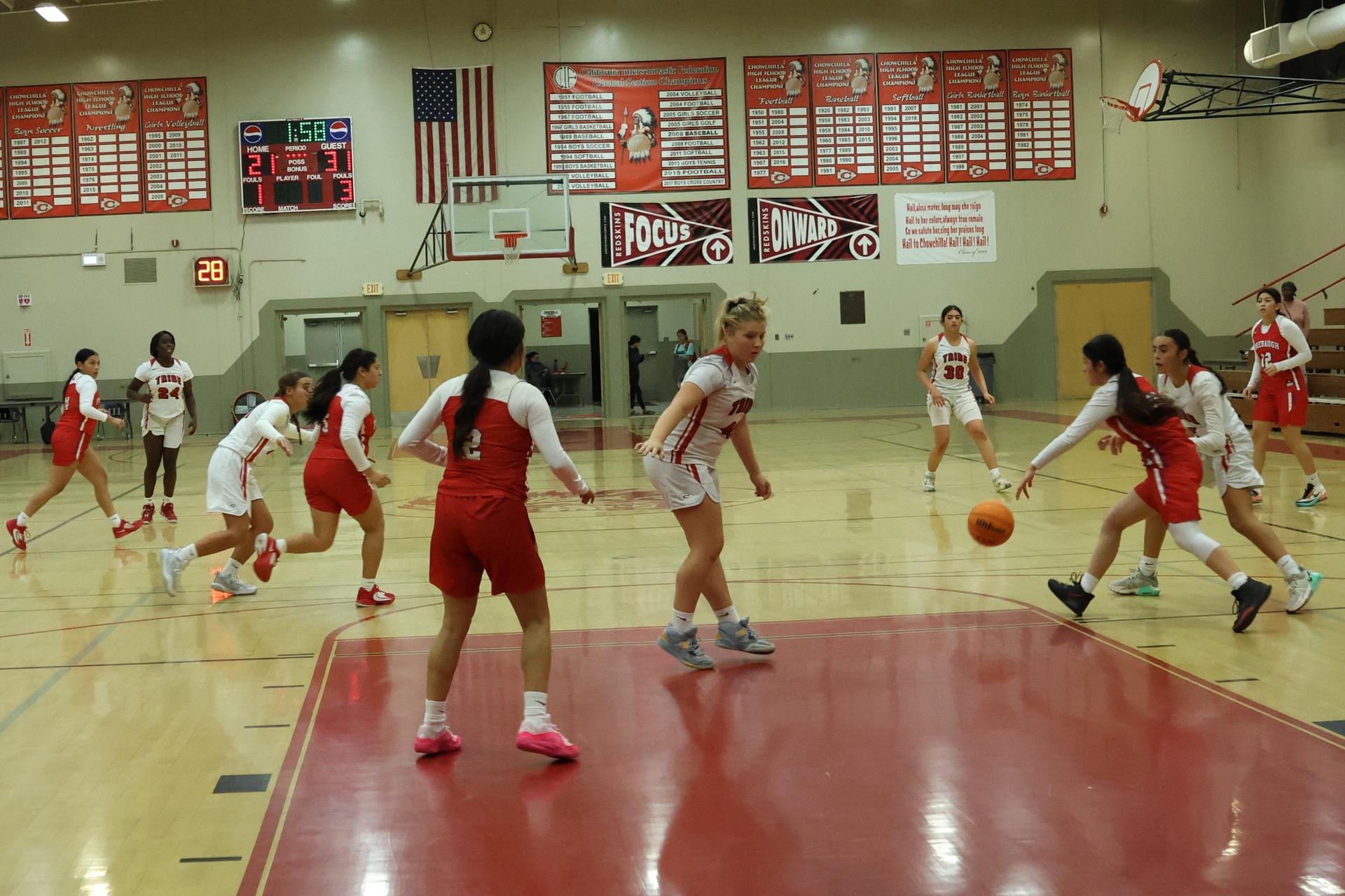 Varsity Girls Basketball playing against Firebaugh