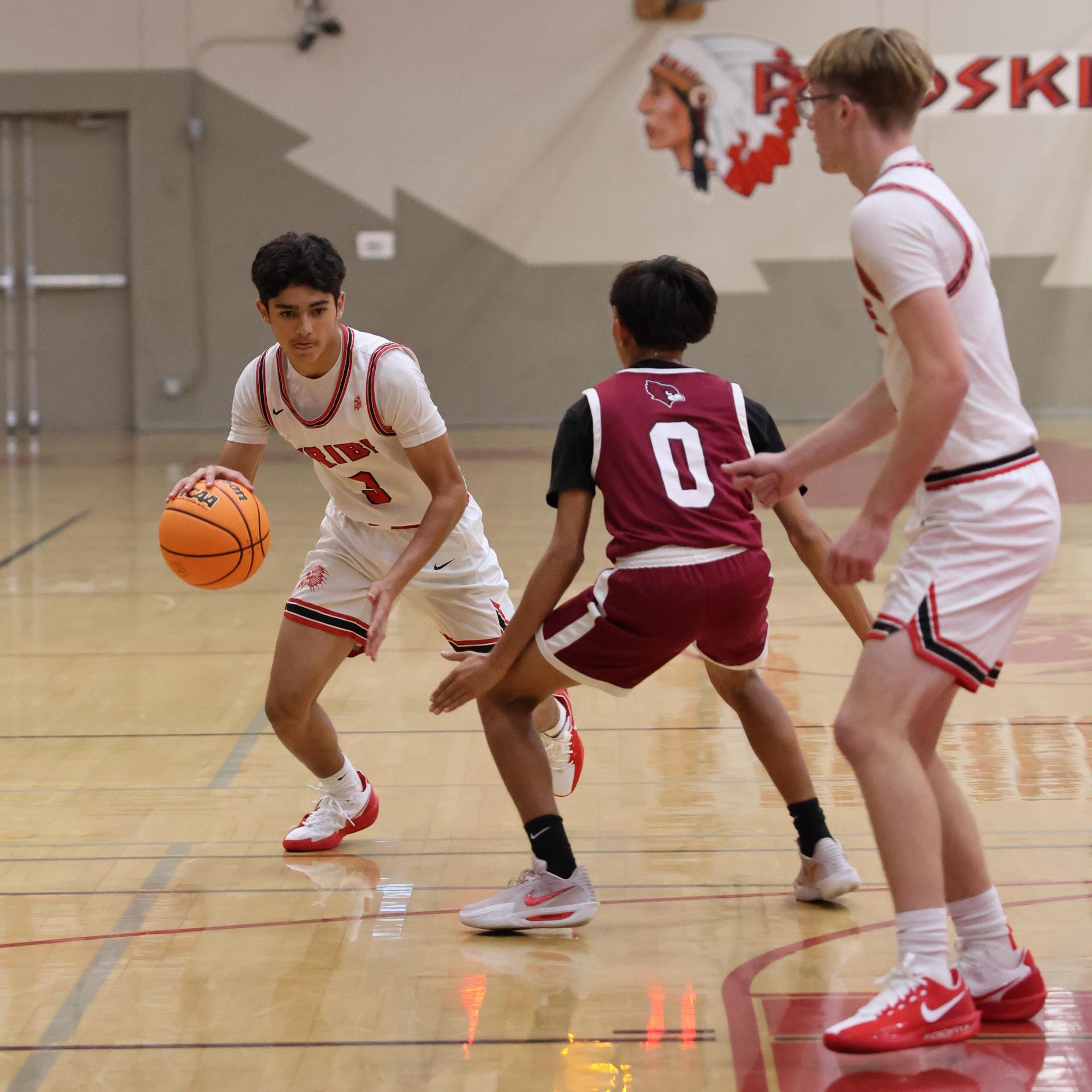 Varsity Boys Basketball playing vs. Orosi 8
