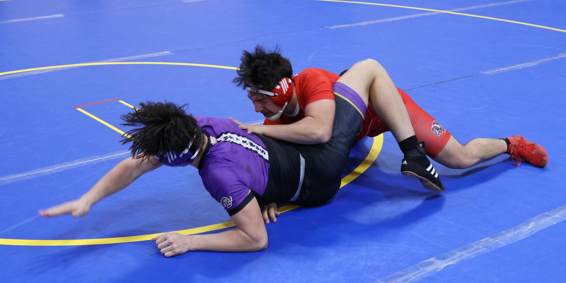wrestlers in action at parlier