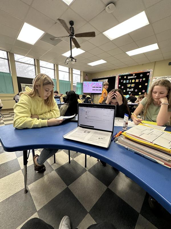 older student helping others