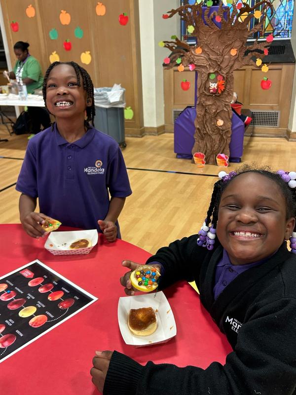 Students eating apple butter