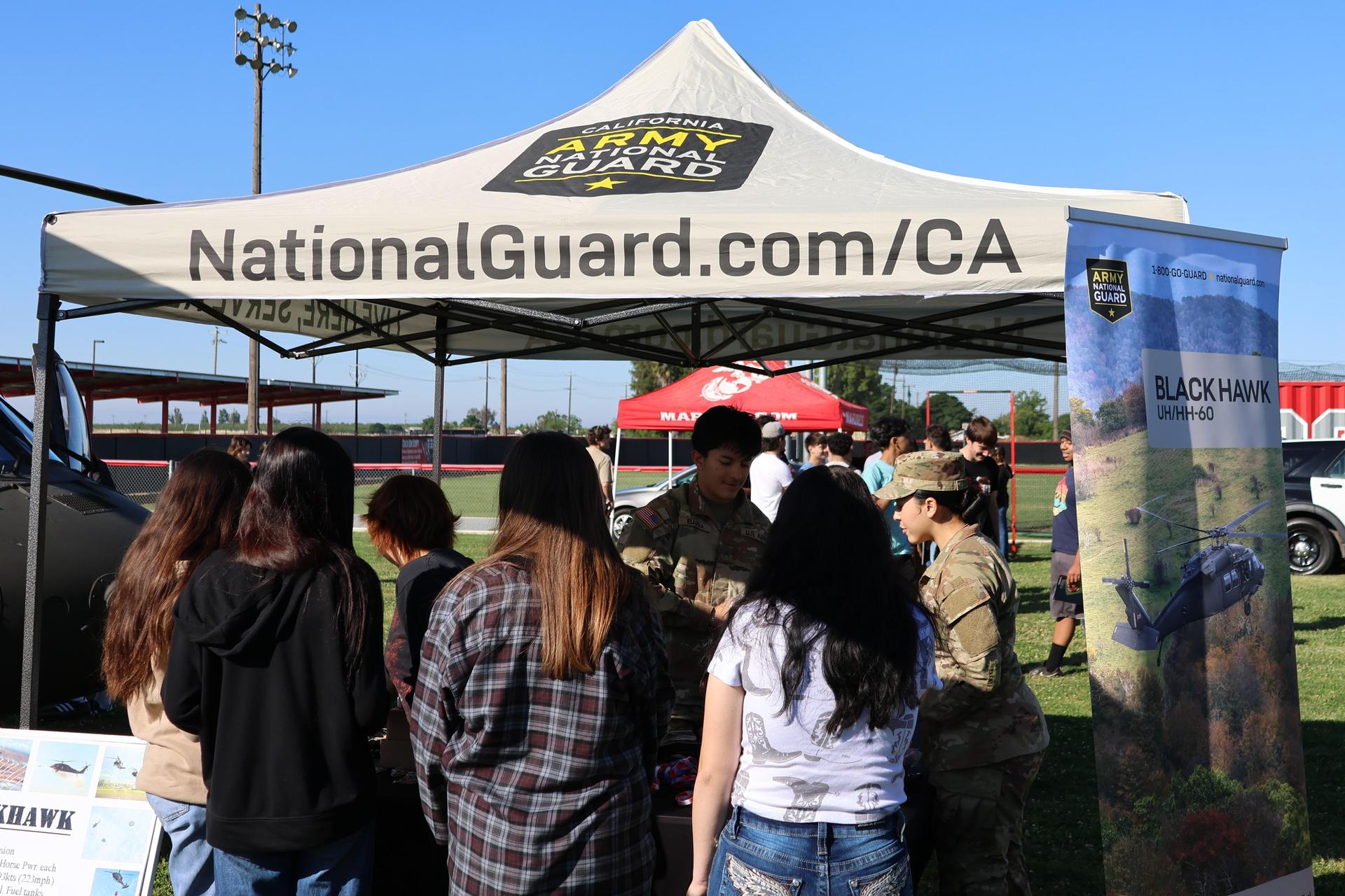 National Guard members speaking to students
