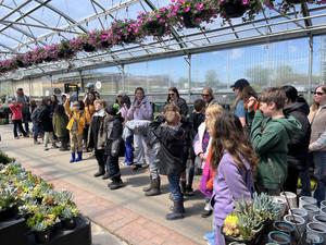 Students visit Cherry Valley Greenhouse to learn more about plants, trees and flowers.