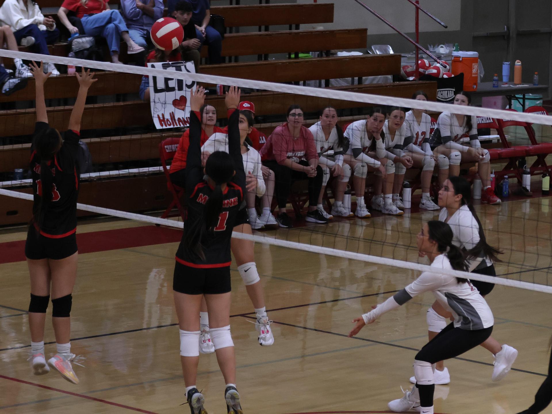 junior varsity girls playing volleyball 63