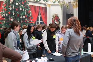 Freshmen girls talk to company representatives about career opportunities