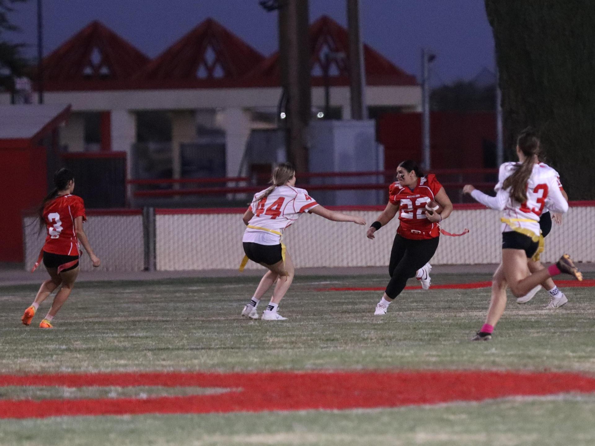 girls playing flag football