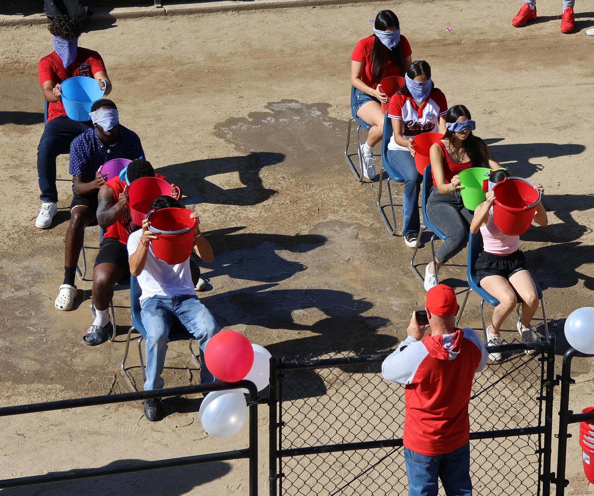 students and staff at the homecoming rally