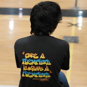 back of person's t-shirt which states Once a Puentista, Always a Puentista.