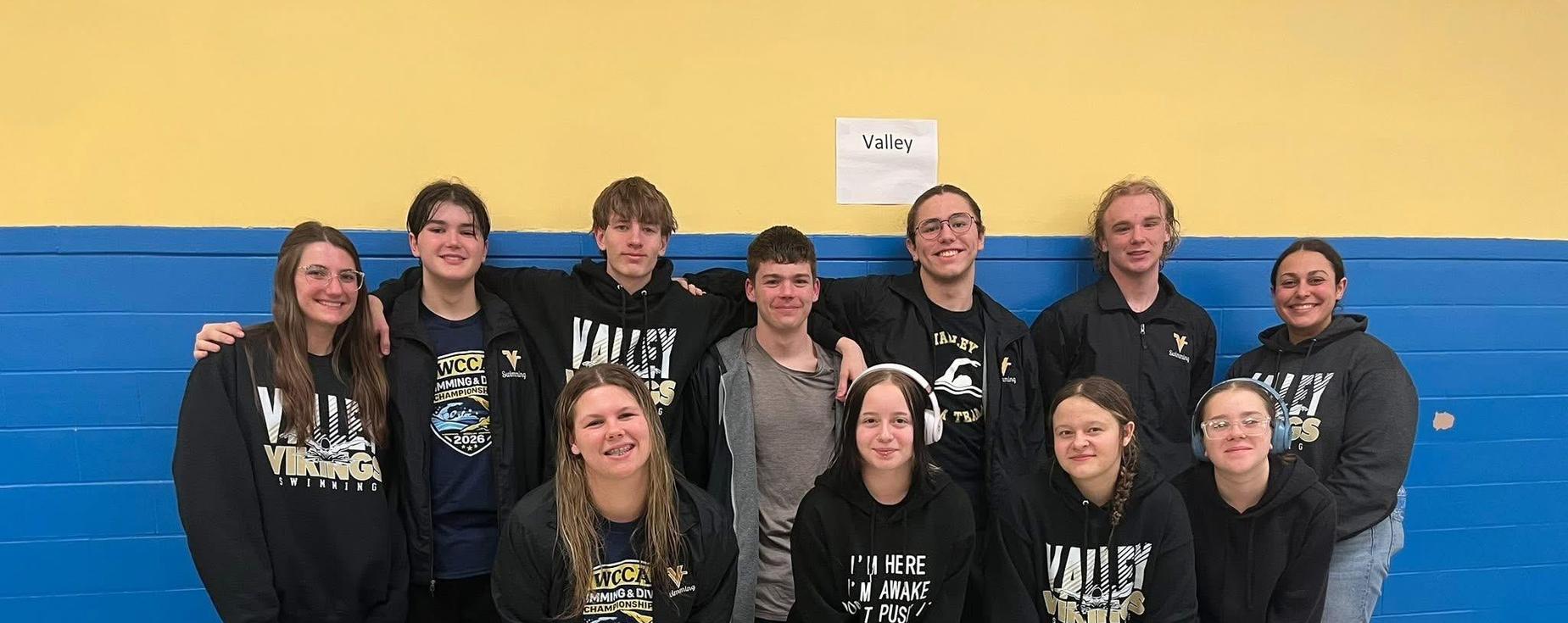 Swim Team posing for a picture