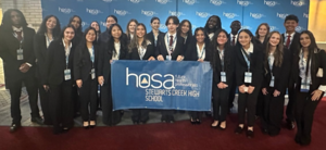 Smiling teens dressed in professional attire